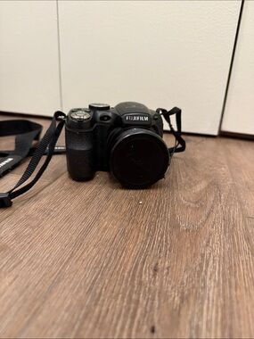 Fujifilm Black Compact Digital Camera with Lens Cap and Strap